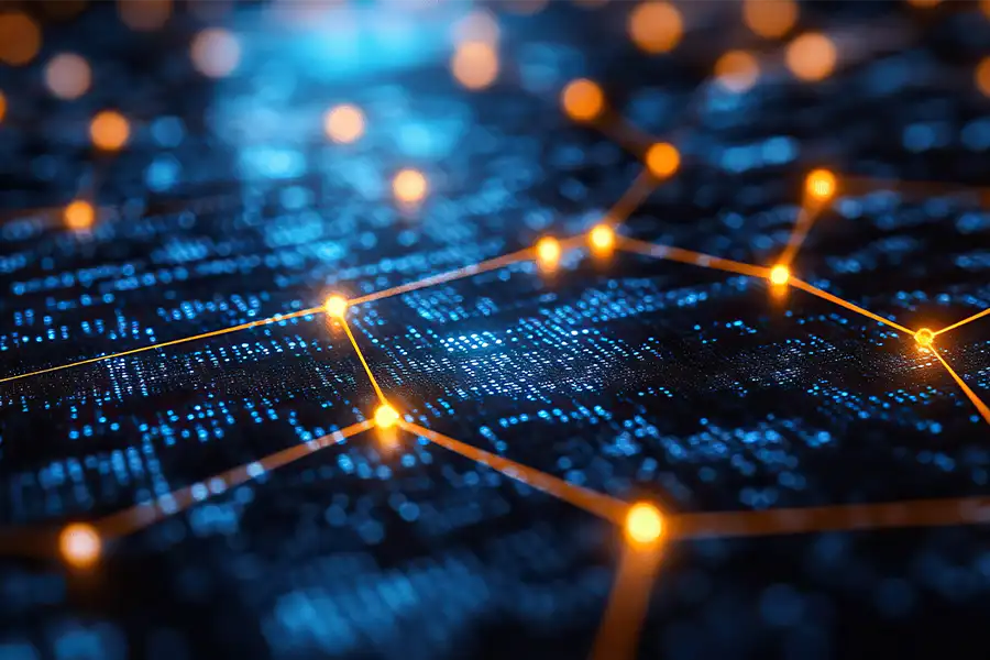 A blue and orange closeup of a neural network over a chipboard.